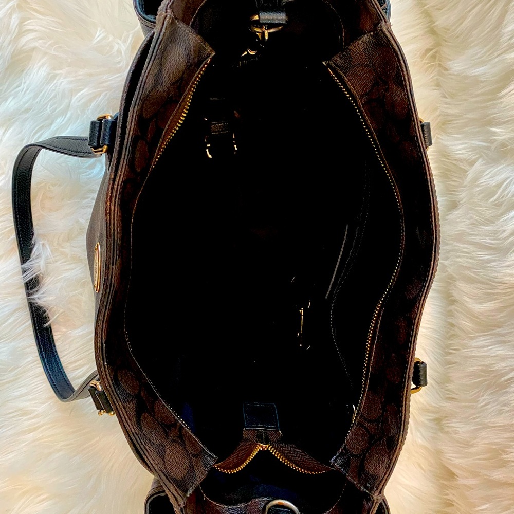 Used- great condition! Please see pictures for wear on front of bag.